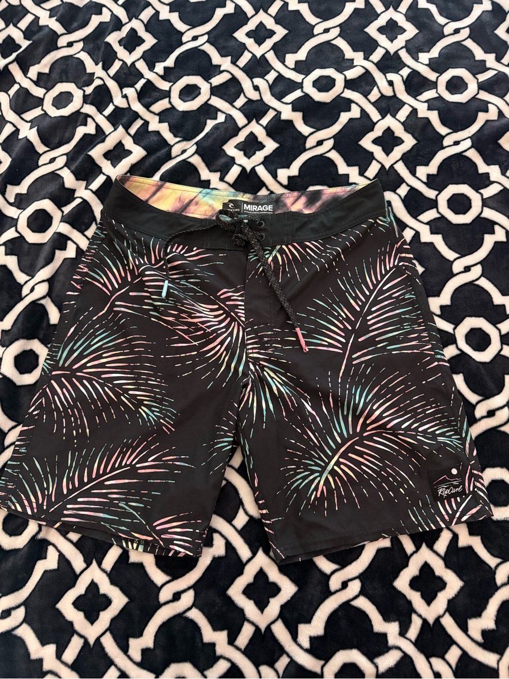 Rip Curl Black Swim Trunks with Pastel Firework Print